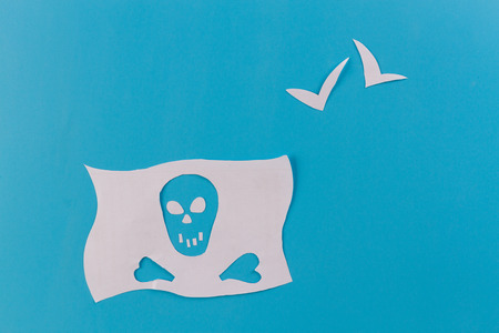 pirate ship concept image. paper cut on blue backgroundの写真素材
