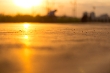 street in orange sunlight. low angle. blurred imageの写真素材