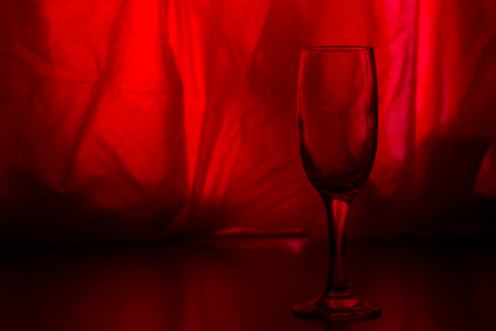 glasses of champagne on red background. party conceptの写真素材