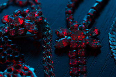 jewellery on dark background in neon light