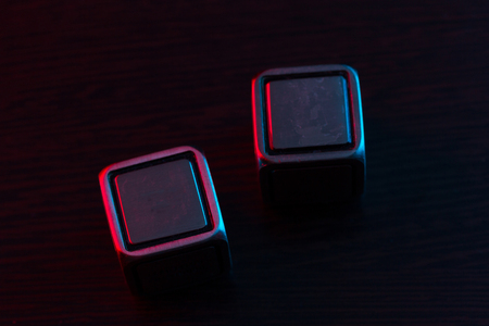 empty dice on black table with copy spaceの写真素材