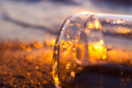 Message in bottle. glass bottle on the beach