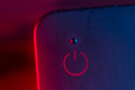 remote red button to turn on. close upの写真素材