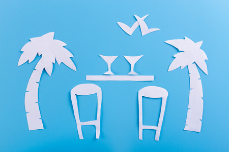 Bar counter with alcohol bottles assortment. paper cutの写真素材