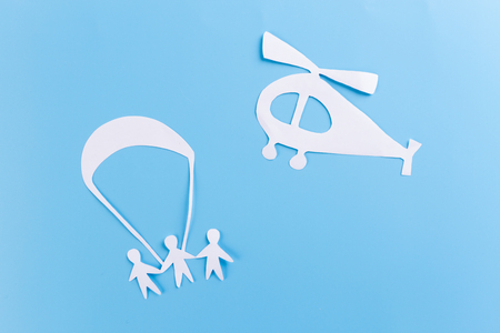 Skydiver freedom concept. paper person and parachuteの写真素材