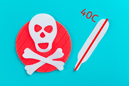 Thermometer shows high temperature. bacterias and virusesの写真素材