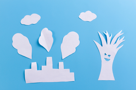 paper factory on blue background. environmental pollution conceptの写真素材