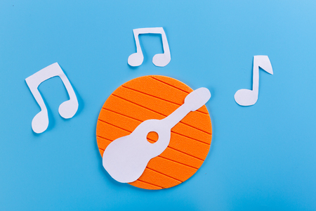 acoustic guitar on blue marble background,music concept.の写真素材