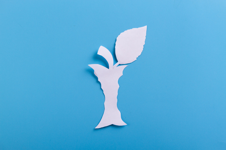 Apple bitten laid out on blue backgroundの写真素材