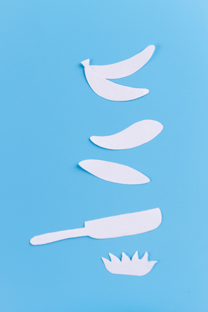 Stack of pancakes on a cast-iron frying pan with fruitsの写真素材