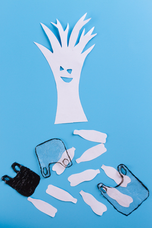 plastic garbage in the forest/ plastic pollution concept