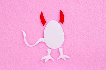 paper art of devil woman. pink background
