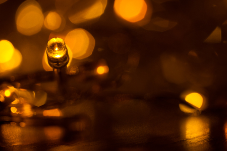 Christmas lights glowing. yellow color close upの写真素材
