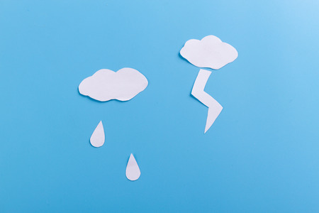 rain clouds on the blue background. minimalの写真素材