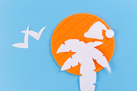 santa hat on palmtree. christmas vacationの写真素材