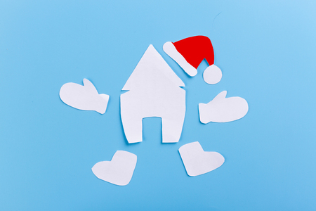 cartoon styled christmas house on blue backgroundの写真素材