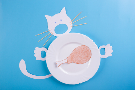 cute hungry cat character on blue backgroundの写真素材