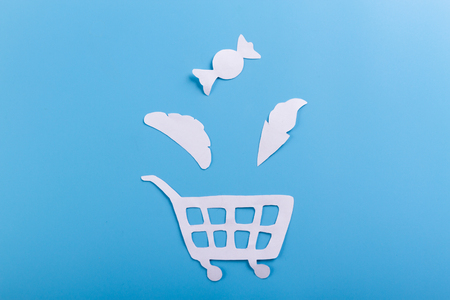 Shopping cart full of food. cartoon styleの写真素材