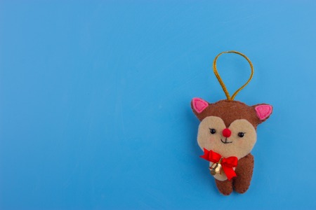 Christmas lovely brown deer on blue background