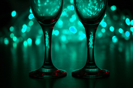 Wineglasses on blurred background. romantic conceptの写真素材