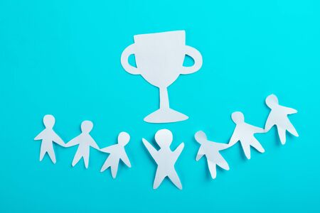 Winner holding trophy cup. cartoon styled imageの写真素材