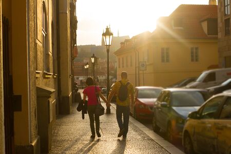 sunny street with people in Prague, Czech Republicの写真素材
