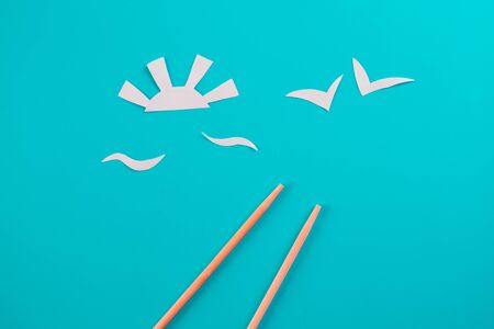 Summer concept image. Paper art of sea and sunの写真素材