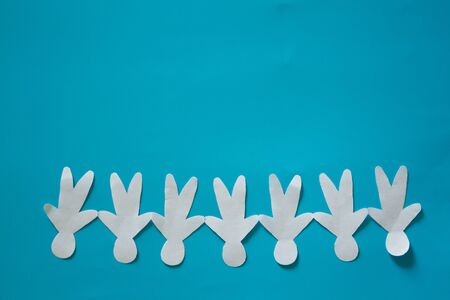 Think differently concept image. Paper people standing on their headsの写真素材