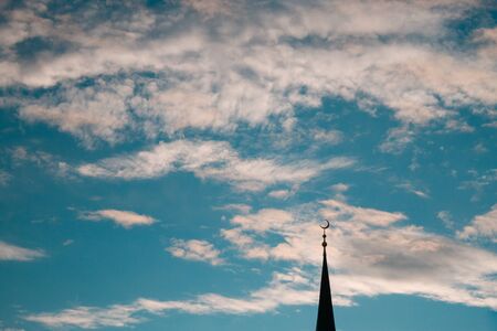 Top of tower over blue sky backgroundの写真素材