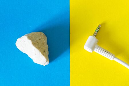 Technological progress concept. From stone to electronic device
