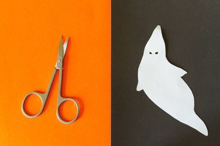Funny ghost character. Halloween concept. Made of paperの写真素材