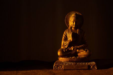 Buddha bronze figurine with copy spaceの写真素材