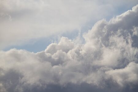 White clounds on the blue sky. Cloudscape