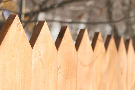 Close up of wooden fence in winter