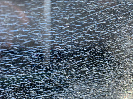 Background with broken glass. Cracked glassの写真素材