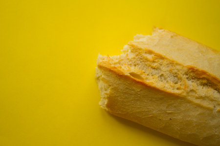 Bread with copy space on yellow background