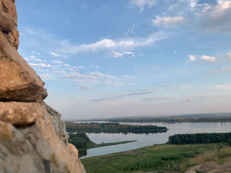 Ruins of ancient and abandoned fortress. View on riverの写真素材