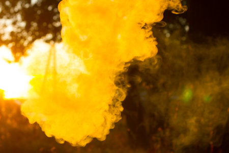 Smoke from cigarette or hookah in sunshineの写真素材