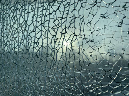 Broken window background. Blurred view from it.の写真素材