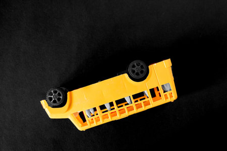 Accident with shcool bus concept. toy bus upside downの写真素材