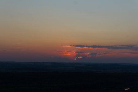 View on the sunset over the fieldの写真素材