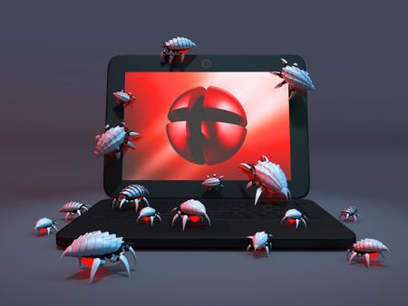 laptop with viruses on a gray backgroundの写真素材