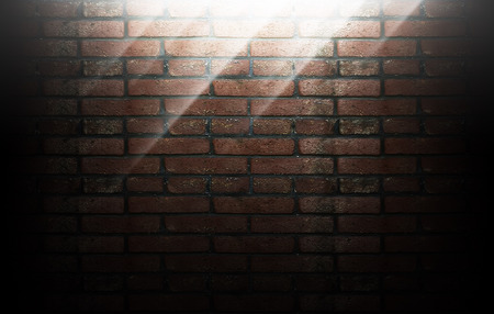 background of brick teny with rays of lightの写真素材