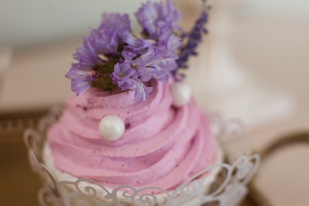 Cake with pink cream natural lavender flowerの写真素材