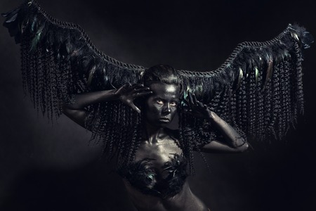 the girl is a dark angelの写真素材