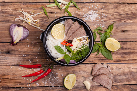 Oriental fo Bo soup on a wooden table