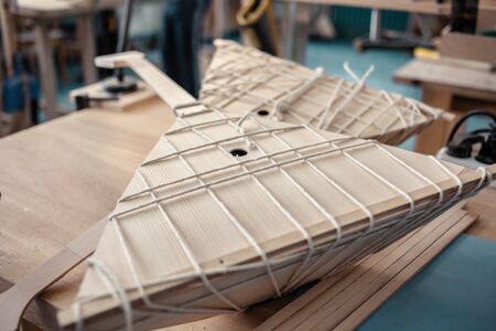 Balalaika production. Balalaika wrapped in ropes. Bonding balalaikaの写真素材