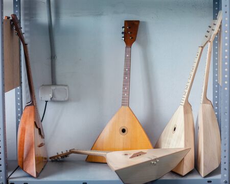 Ready-made balalaika in a musical instrument warehouse