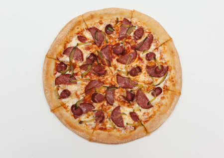 Pizza with sausage on a white backgroundの写真素材