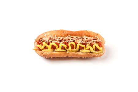 Hotdog with mustard on a white backgroundの写真素材